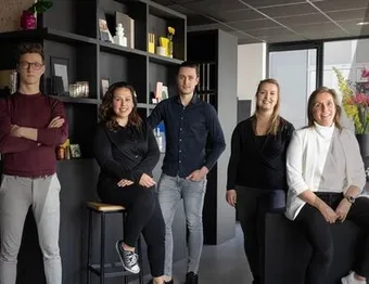 Two women looking at laptop